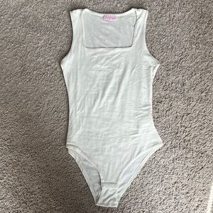 Pink Lily body suit